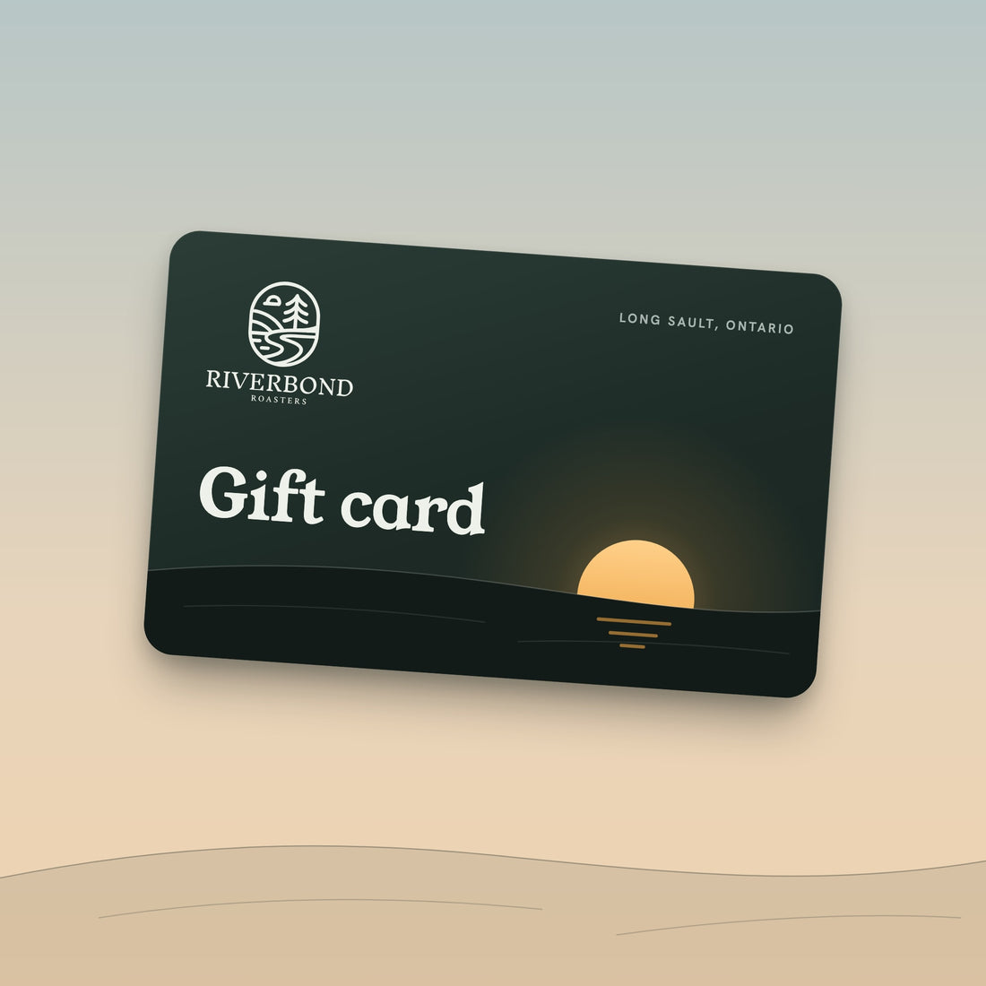 The Riverbond Roasters gift card under a dawn sky